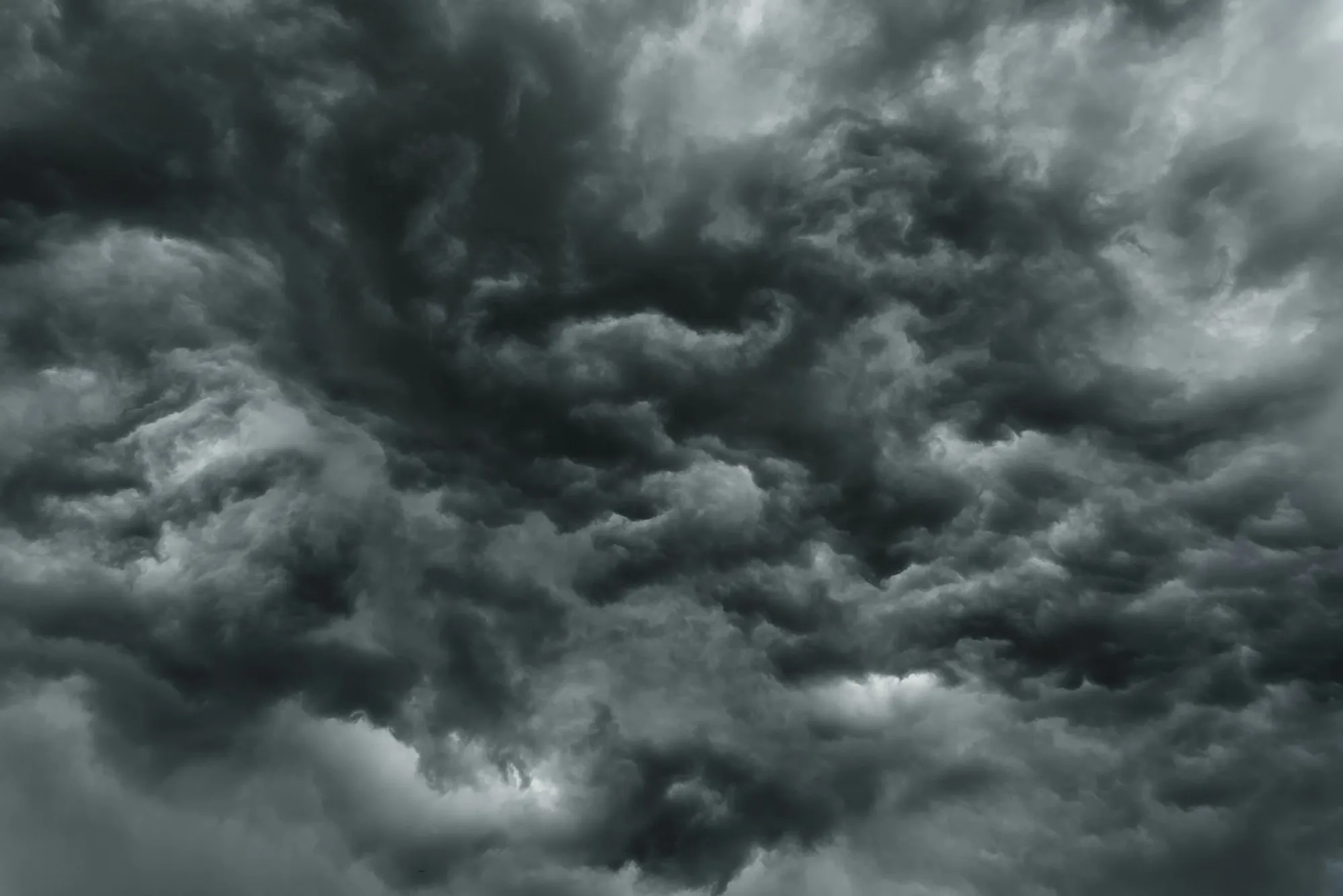 Churning gray storm clouds filling the sky